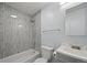 Bathroom featuring a toilet, vanity with storage, tile flooring and backsplash at 1865 S Knox Ct, Denver, CO 80219