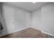 Comfortable bedroom with hardwood floors and neutral wall color to compliment any decor style at 1865 S Knox Ct, Denver, CO 80219