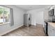 Bright kitchen area showcasing new appliances, and providing ample space for cooking and storage at 1865 S Knox Ct, Denver, CO 80219