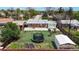 Spacious backyard featuring a trampoline, storage shed, patio and well-maintained lawn at 11261 Clarkson St, Northglenn, CO 80233