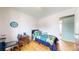 Comfortable bedroom with hardwood floors and ample natural light at 11261 Clarkson St, Northglenn, CO 80233