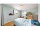 Comfortable bedroom features a window, hardwood floors, and stylish decor to create a relaxing retreat at 11261 Clarkson St, Northglenn, CO 80233