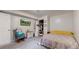 Cozy bedroom with closet and television creates a comfortable retreat space at 11261 Clarkson St, Northglenn, CO 80233