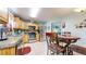 Bright eat-in kitchen featuring stainless steel appliances and granite countertops at 11261 Clarkson St, Northglenn, CO 80233