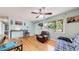 Open living room featuring wood floors, access to front door and natural light at 11261 Clarkson St, Northglenn, CO 80233