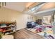 Bright living room with skylights, hardwood floors, and a colorful rug, perfect for Gathering gatherings at 2684 S Adams St, Denver, CO 80210