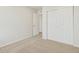 Comfortable bedroom featuring neutral walls and soft carpet flooring at 6504 N Malaya St, Aurora, CO 80019