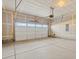 Spacious two car garage with concrete floor and in-progress drywall at 6504 N Malaya St, Aurora, CO 80019