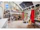 Unique bedroom design with lofted bed, decorated walls and ample space for creative expression at 7717 S Grape Ct, Centennial, CO 80122
