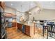 Spacious kitchen with wood cabinets, granite countertops, stainless steel appliances at 7717 S Grape Ct, Centennial, CO 80122