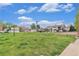 Beautifully maintained community park with playground, gazebo, and volleyball court on a sunny day at 10150 E Virginia Ave # 13-204, Denver, CO 80247