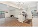 Living room features a fireplace, hardwood floors, and an open concept kitchen at 10150 E Virginia Ave # 13-204, Denver, CO 80247