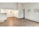 Spacious living area with sleek hardwood floors, high ceilings, and bright natural light at 10150 E Virginia Ave # 13-204, Denver, CO 80247
