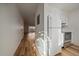 Modern kitchen with stainless steel appliances, white cabinets, and sleek countertops at 1028 Coronado Pkwy # C, Denver, CO 80229