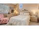 Comfortable bedroom showcasing a plush bed, soft lighting, and relaxing ambiance at 4931 Garrison St # 204G, Wheat Ridge, CO 80033