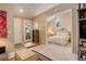 Bright bedroom featuring a large window and a comfortable bed, creating a serene retreat at 4931 Garrison St # 204G, Wheat Ridge, CO 80033