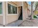 Street level entrance showcasing the unit number, well-maintained stairs, and tasteful exterior finishes at 4931 Garrison St # 204G, Wheat Ridge, CO 80033