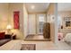 Inviting foyer with two doors, wood floors, and a decorative rug welcomes you into this cozy home at 4931 Garrison St # 204G, Wheat Ridge, CO 80033