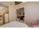 Bright room showcasing access to multiple rooms, comfortable seating, and a decorative rug at 4931 Garrison St # 204G, Wheat Ridge, CO 80033