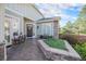 Inviting front porch with stone accents, seating area, and stylish decor elements at 16929 W 63Rd Ln, Golden, CO 80403