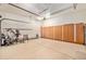 Spacious garage with ample storage cabinets and room for vehicles and equipment at 16929 W 63Rd Ln, Golden, CO 80403