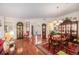 Elegant living room and dining area featuring hardwood floors and stylish decor at 16929 W 63Rd Ln, Golden, CO 80403