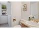 Bathroom features a toilet and a sink with a granite countertop at 20396 E Berry Pl, Centennial, CO 80015
