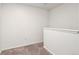 A simple spare bedroom or open loft space with neutral carpet is ready for a personal touch at 20396 E Berry Pl, Centennial, CO 80015