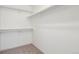 Walk-in closet features shelving to maximize storage at 20396 E Berry Pl, Centennial, CO 80015