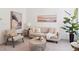 Inviting living room with neutral tones, comfortable seating, and tasteful decor creating a relaxing space at 20396 E Berry Pl, Centennial, CO 80015