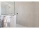 Walk-in shower with sleek gray tiling and glass enclosure at 20396 E Berry Pl, Centennial, CO 80015
