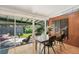 View of the dining room with sliding glass doors opening to the backyard at 658 Poplar St, Denver, CO 80220