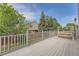 This home has a back deck perfect for outdoor entertaining, featuring a bench swing at 20431 E Union Cir, Aurora, CO 80015