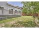 The backyard has a well-maintained lawn, a deck, and a wood fence at 20431 E Union Cir, Aurora, CO 80015