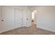Bedroom with a closet and view into another bedroom at 3733 W 97Th Ave, Westminster, CO 80031