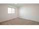 Well-lit bedroom with carpet floors, a window, and neutral walls at 3733 W 97Th Ave, Westminster, CO 80031