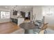Inviting dining area adjacent to an eat-in kitchen, filled with natural light and comfortable seating at 3733 W 97Th Ave, Westminster, CO 80031