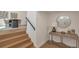 Bright entryway with wood floors, a console table, and a round mirror welcoming you home at 3733 W 97Th Ave, Westminster, CO 80031