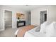 Bedroom with carpet, neutral paint, a modern bed frame and decor, adjacent to a large walk-in closet at 4355 Cyan Cir # E, Castle Rock, CO 80109
