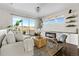 Inviting living room with modern decor, fireplace, and a large sliding glass door offering scenic views at 4355 Cyan Cir # E, Castle Rock, CO 80109