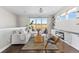 Bright living room with sliding glass doors, contemporary furniture, and a stone fireplace for a modern feel at 4355 Cyan Cir # E, Castle Rock, CO 80109