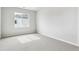 This carpeted bedroom receives lots of natural light from the bright window at 2548 Lupton Ln, Lafayette, CO 80026