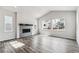 Bright living room with high ceiling and contemporary fireplace and large windows at 2548 Lupton Ln, Lafayette, CO 80026