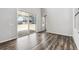 Bright living room featuring sliding glass doors that lead to a patio and backyard at 2548 Lupton Ln, Lafayette, CO 80026