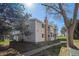 Charming townhouse featuring a stone chimney and private balcony at 14171 E Jewell Ave # 203, Aurora, CO 80012