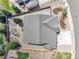 Overhead shot of home's roof, backyard landscaping, and privacy fence at 1034 Halfmoon Dr, Castle Rock, CO 80104
