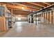 Spacious unfinished basement offering ample potential for customization at 1034 Halfmoon Dr, Castle Rock, CO 80104