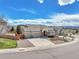 Charming home featuring a well-maintained yard and a spacious three-car garage at 1034 Halfmoon Dr, Castle Rock, CO 80104