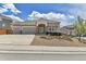 Beautiful single-Gathering home with a landscaped front yard and a welcoming entrance at 1034 Halfmoon Dr, Castle Rock, CO 80104