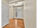 Foyer featuring hardwood floors and a white front door with window above at 1034 Halfmoon Dr, Castle Rock, CO 80104